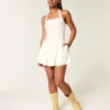 Mini-kjole med lav midje og halterneck