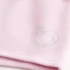 Mini-shorts i fleece med hjerte-grafikk