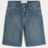 Mørkvaskede, superbaggy denimshorts under kneet