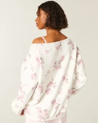 Oversized off-the-shoulder sweatshirt med blomstermønster og sløyfe Oversized off-the-shoulder sweatshirt med blomstermønster og sløyfe