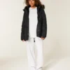 Parkas med fuskepelsfôr