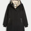 Parkas med fuskepelsfôr
