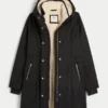 Parkas med fuskepelsfôr