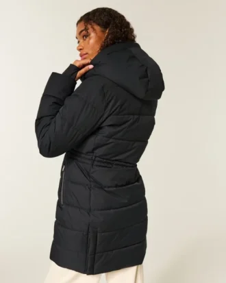 Pufferparkas med fuskepelsfôr