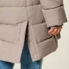 Pufferparkas med fuskepelsfôr