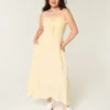 Stroppeløs smocked maxi-kjole