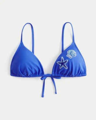 Triangelbikinitopp med perler over skuldrene