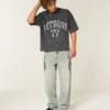 Tung baggy kort fotball-T-skjorte med Detroit-grafikk