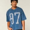 Tung baggy kort fotball-T-skjorte med grafikk