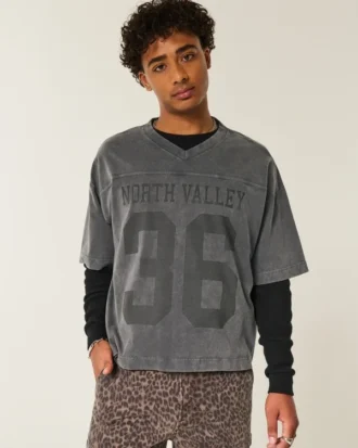 Tung baggy kort fotball-T-skjorte med grafikk