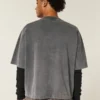 Tung baggy kort fotball-T-skjorte med grafikk