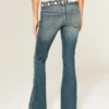 Ultra lav midje, brodert belte, medium vasket flare-jeans