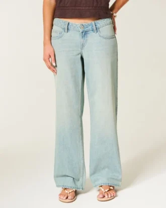 Ultra lav midje, lys vask, baggy jeans med spenne bak