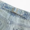 Ultra lav midje, lys vask, baggy jeans med spenne bak