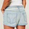 Ultra lav midje, lys vask, denim minishorts med blonder