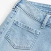 Ultra lav midje, lys vask, frontlomme, flare-jeans