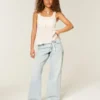 Ultra lav midje, lys vask, mini linning, baggy jeans med snøring