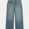 Ultra lav midje, medium vask, brodert baggy jeans