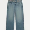 Ultra lav midje, medium vask, brodert baggy jeans