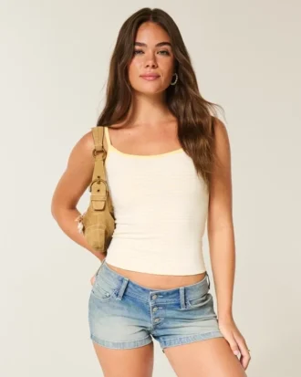 Ultra lav midje, medium vasket denim shorts