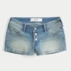 Ultra lav midje, medium vasket denim shorts