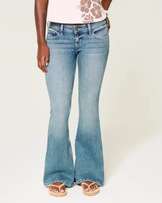 Ultra lav midje, medium vasket flare-jeans Ultra lav midje, medium vasket flare-jeans