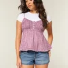 Ultra lav midje, slitt mediumvasket denim minishorts