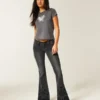 Ultra lavt sittende blomsterbroderte, vasket svarte flare-jeans