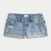 Ultra lavt sittende broderte denim-minishorts
