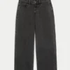 Ultra lavt sittende, vasket svart baggy jeans med spenne bak
