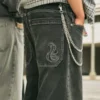 Vasket svart brodert slange skater baggy jeans