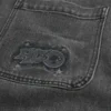 Vasket svart logo grafisk baggy jeans