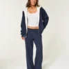 Vendbar fleece-hoodie med glidelås og fuskepelsfôr