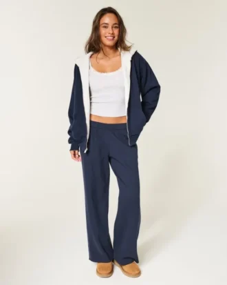 Vendbar fleece-hoodie med glidelås og fuskepelsfôr