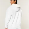 Vendbar fleece-hoodie med glidelås og fuskepelsfôr