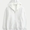Vendbar fleece-hoodie med glidelås og fuskepelsfôr